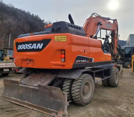 मूल कोरियाई इस्तेमाल किया Doosan DH140W अच्छी हालत पहिया खुदाई के साथ